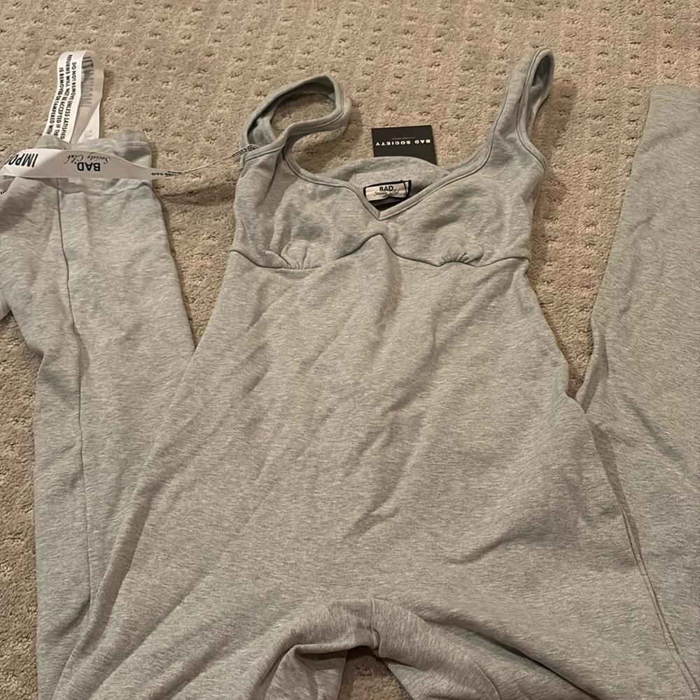 Bad Society grey open back jumpsuit NWT